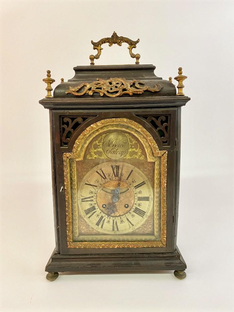 German Bracket Clock: Matz MatZen (1720)-1809) German bracket clock with copper face and brass chapter ring with Roman numberals, signed M. Wied, Satrup, wood and gilted case 21"h x 11"w x 6"d
