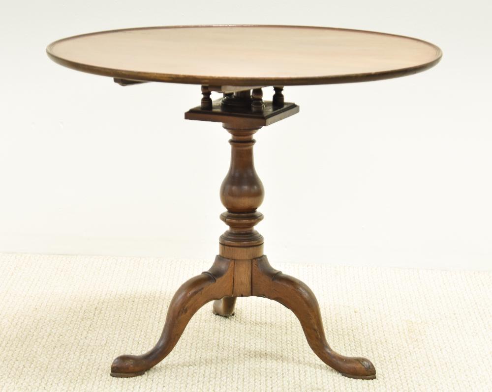Pennsylvania Queen Anne Tea Table: Pennsylvania Queen Anne walnut tea table with dish top, bird cage support, turned shaft and pad feet, circa 1780 28.5"h x 35"dia