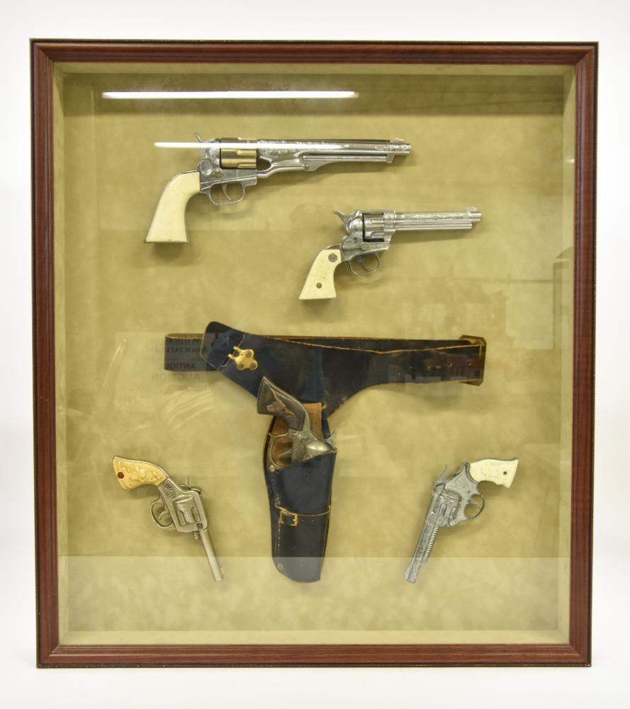 Reproduction Hand Gun Collection: Shadow box, framed, reproduction hand gun collection, some signed, Buffalo Bill; Kit Carson; Wild Bill Hickok 31"h x 20"w x