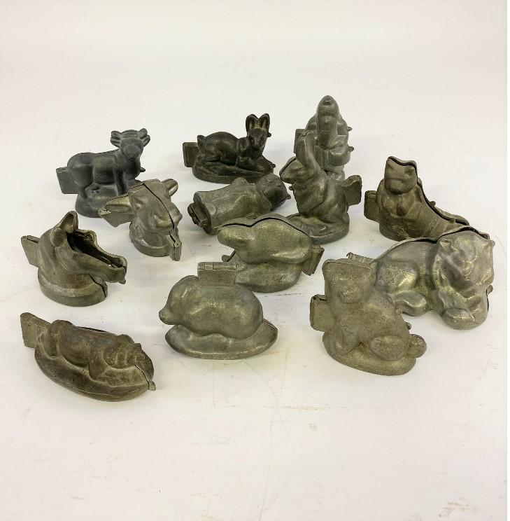 Pewter Animal Ice Cream Molds: Thirteen pewter animal and Santa ice cream molds by E & Co., N.Y. and S & Co. Schmelzer, etc. Santa 4"h