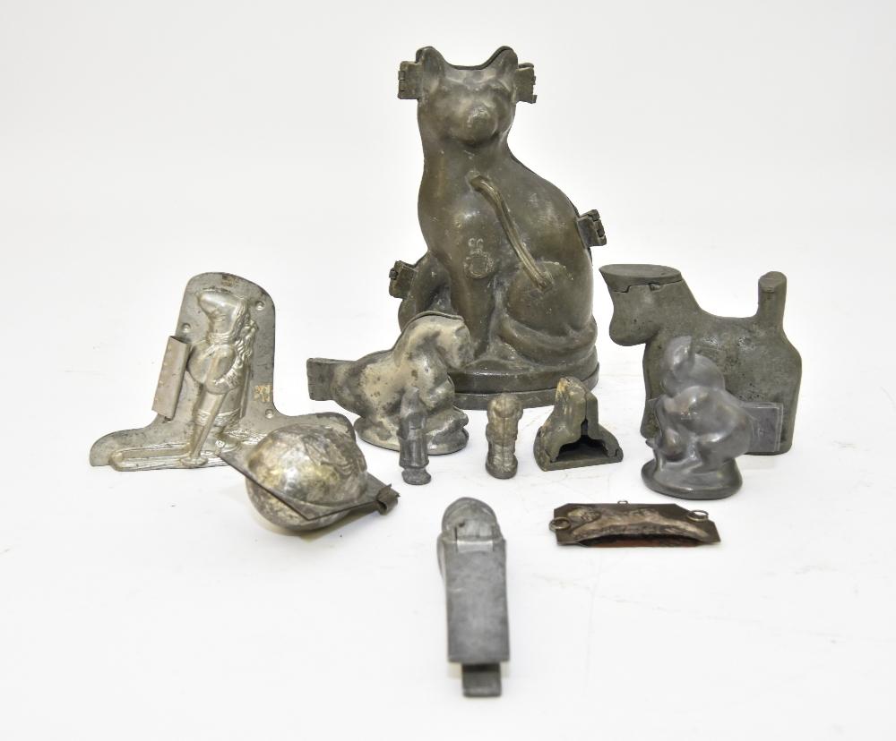 Pewter Ice Cream & Chocolate Molds: Large pewter ice cream mold 10.25"h x 6.25"w, a horse and goat; together with some chocolate molds, etc.