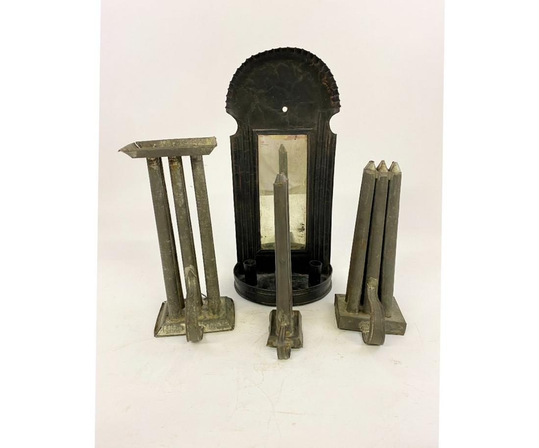 Large Tin Mirrored Wall Sconce: Large tin mirrored three candle wall sconce, 19th c. 19" x 8.5"; together with three candle molds