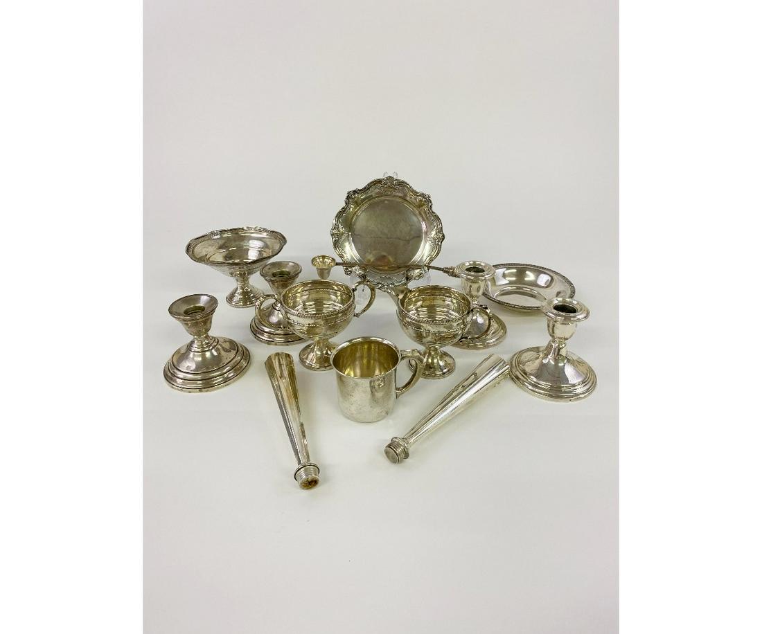 Sterling Silver Tableware: Sterling silver and weighted sterling silver tableware to include four low candlesticks 4"h etc.