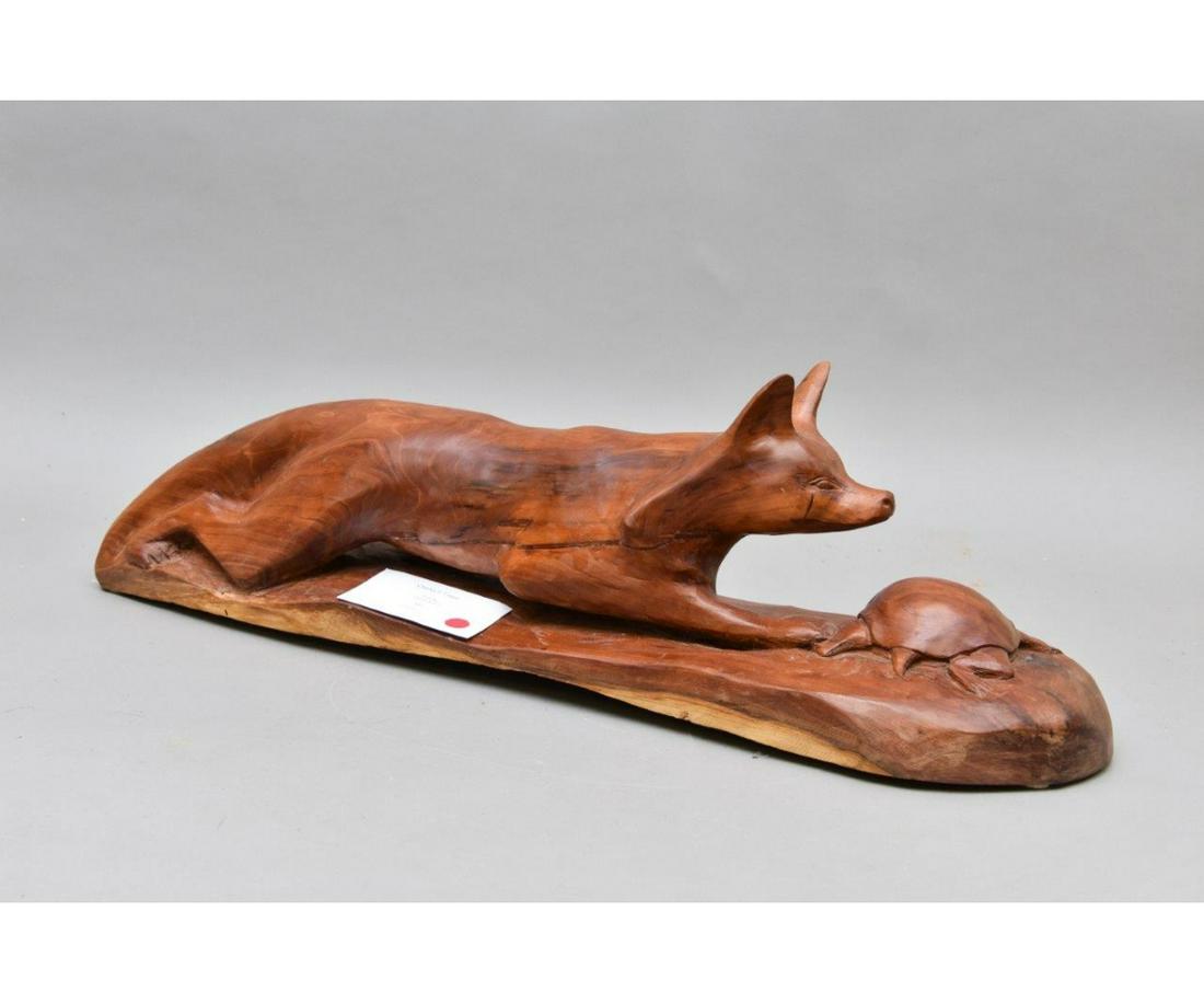 Charles F. Logue Carving of a Fox and Turtle: Charles F. Logue, artist, cherry wood carving of a fox and turle, titled "Gotcha" 10"h x 9"w x 33"l x 9"w