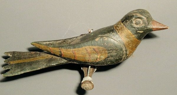 German carved bird on a stand with polychrome deco