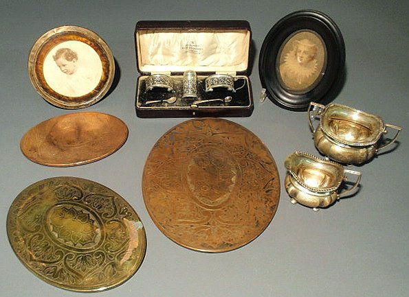 Misc. grouping to include an English silver creame: Misc. grouping to include an English silver creamer & sugar bowl, cased salt & pepper set, frames, copper & brass trivets, etc.