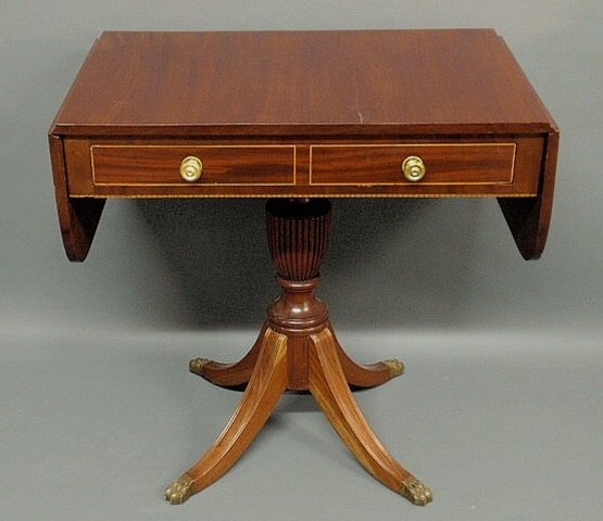 American Sheraton mahogany sofa table, c.1820, wit: American Sheraton mahogany sofa table, c.1820, with inlaid drawer and skirt and drop leaves. 29.25"h.x30.5"w.x20"d., leaves 10.5