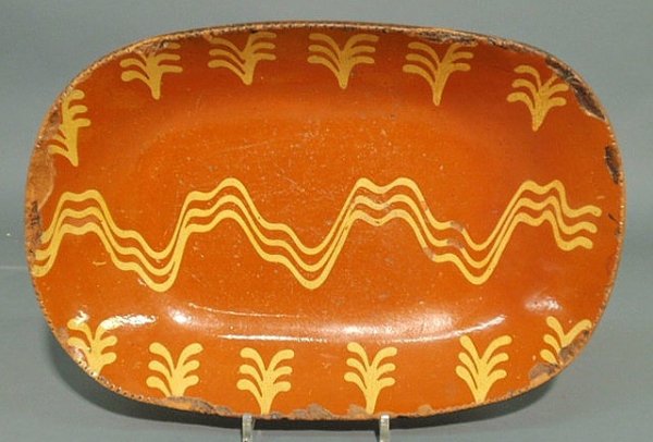 Pennsylvania redware loaf dish, 19th c., with yell