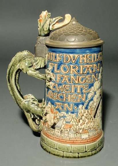 Mettlach stein #1786 with dragon form handle. 8.25: Mettlach stein #1786 with dragon form handle. 8.25"h., base 4"dia.