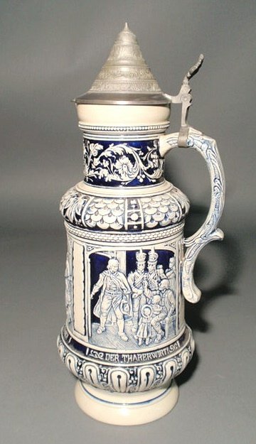 Blue stoneware stein from original 1894 mold and m: Blue stoneware stein from original 1894 mold and marked "Western Germany". 16.75"h., base 5"dia.