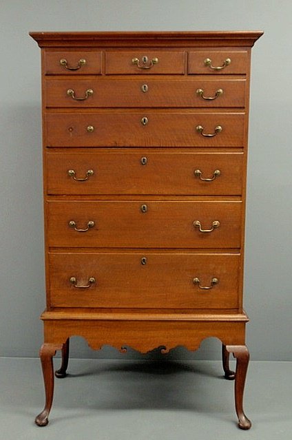 Pennsylvania Queen Anne walnut chest-on-frame with: Pennsylvania Queen Anne walnut chest-on-frame with a molded cornice and scalloped skirt. 74.5"h.x38"w.x20"d.