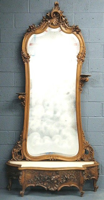 French walnut pier mirror with heavy carvings, bev: French walnut pier mirror with heavy carvings, beveled glass and marble top on the lower section. 103"h.x51"w.x12"d.