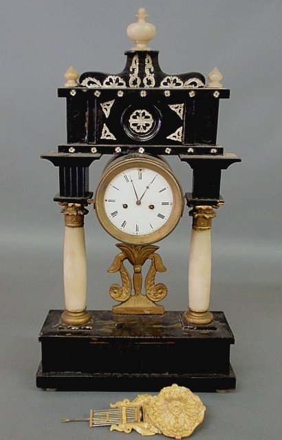 French ebonized wood mantel clock, c.880, with mot: French ebonized wood mantel clock, c.880, with mother-of-pearl decoration and alabaster columns. 24”h.x12.25”w.x4.25”d.