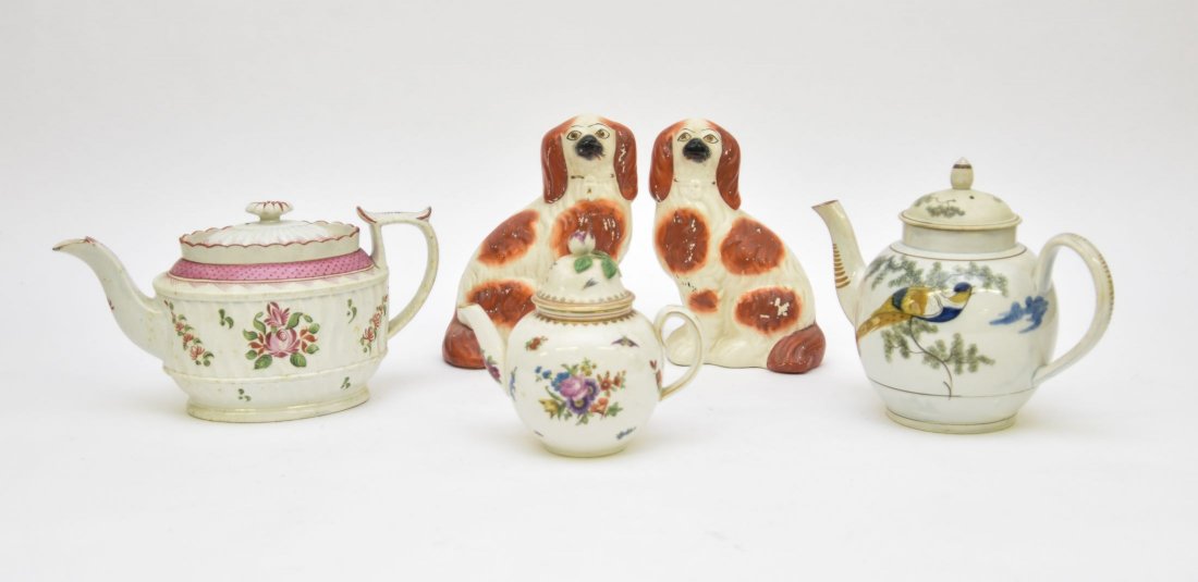 English Creamware Pea Fowl Teapot etc.: English pea fowl creamware teapot, 19th c. 7"h; a pair of Staffordshire spaniels 7.5"h; a Queen's Rose teapot; and a Booths teapot