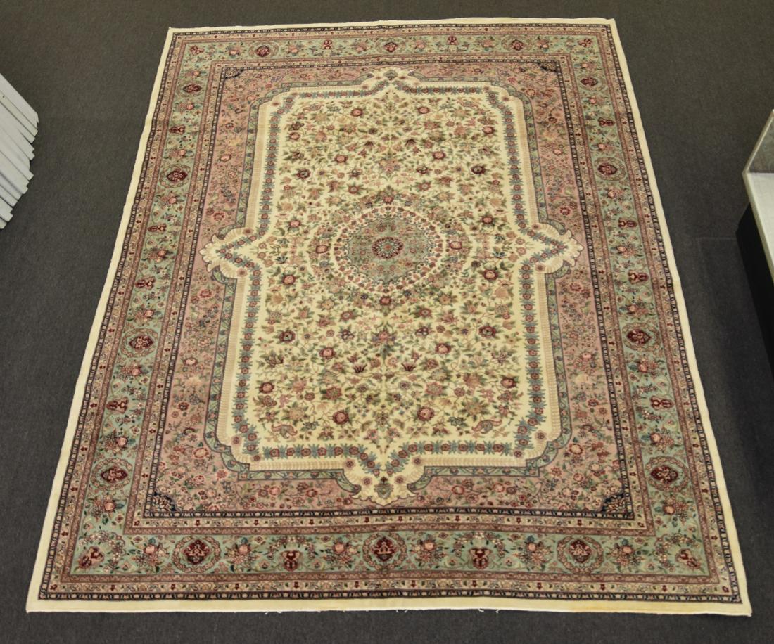 Tabriz Carpet: Palace-sized colorful Tabriz carpet having a center rosette, beige field, with light green border and overall floral pattern 13'-8.5" x 9'-9.5"