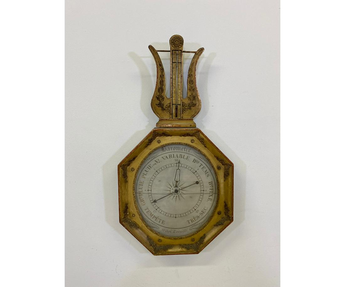 French Gilt Barometer: French gilt barometer of lyre and octagonal form, 19th c. signed "Selon Toricelli" 33.5"h x 17.75"w