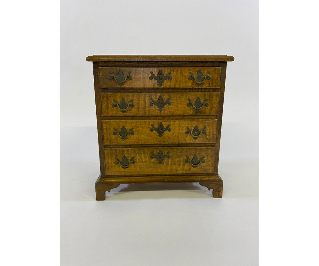 Miniature Chippendale Style Chest of Drawers: Miniature Chippendale style tiger maple chest of drawers, 20th c. bench made 13"h x 12"w x 8"d