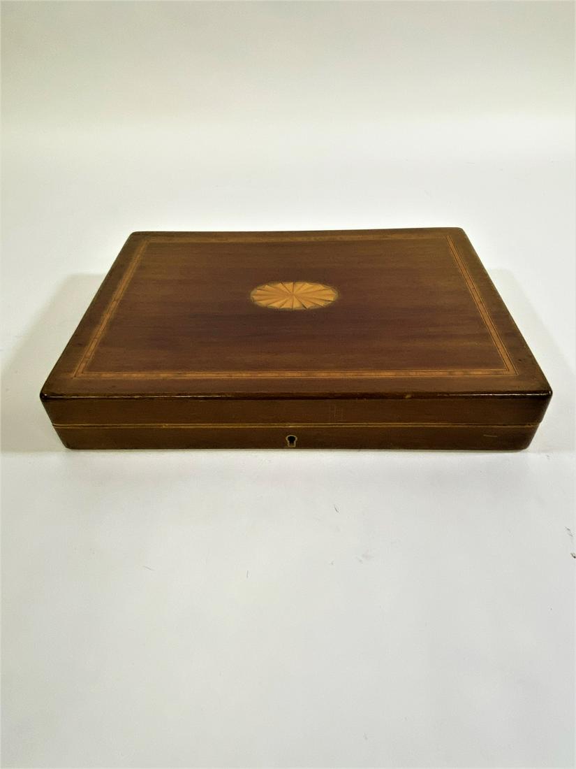 Silverplate Flatware Set: Mahogany cased silverplate and bone-like handled flatware service for twelve, probably early 20th c., forks 7"l, knives 8"l Box is 2.5"h x 14" x 10"