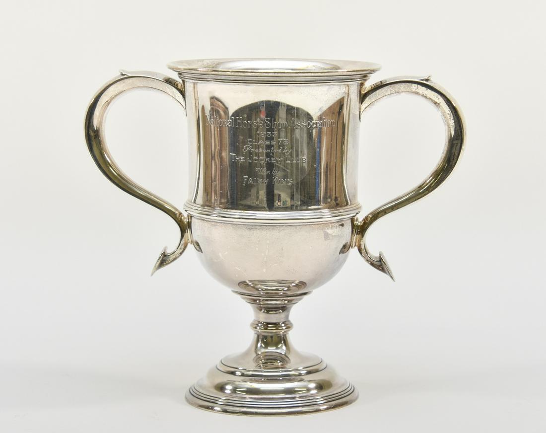 Sterling Silver Equine Loving Cup: Sterling silver equine loving cup by Gorham, inscribed 'National Horse Show Association 1933, Class of 78, Presented by the Jockey Club, won by Fairy King' 11"h x 13"w / 16 troy oz