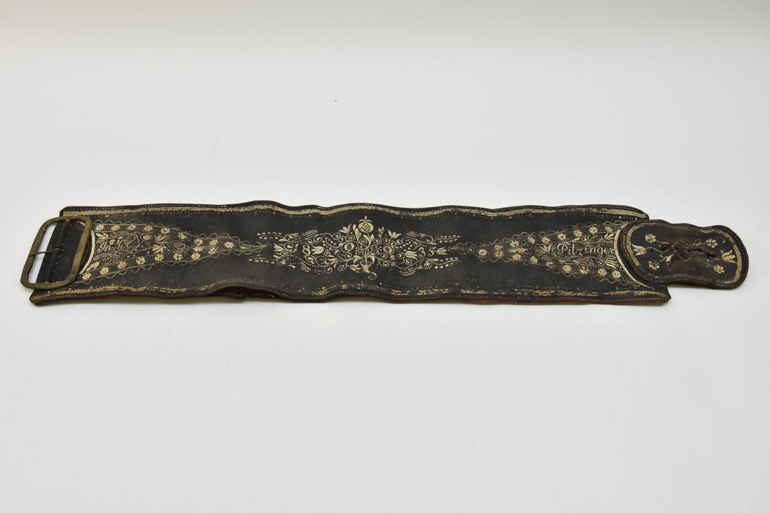 18th c. Quill-Embroidered German Work Belt: Wide goose quill embroidered leather work belt (bauchrahzen), beautifully decorated with flowers and garlands, belt name Jakob Pilzinger (1835), with original brass buckle, of Bavarian origin Belt: 29