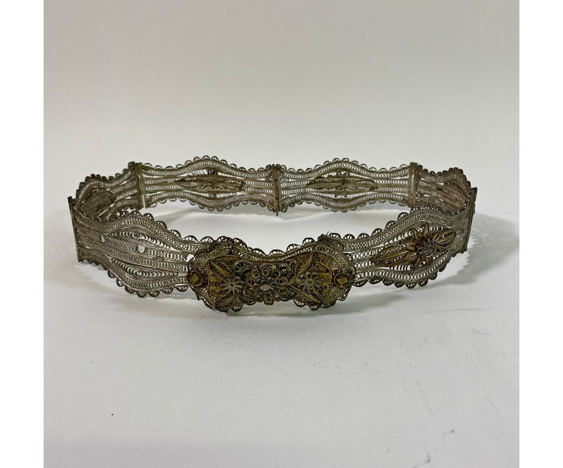 Bulgarian Filigree Silver Gilt Belt: Bulgaria, Vidin or Vratza, filigree silver gilt alloy belt, 19th c., with brass/copper and silver filigree appliques 32.5"l x 1.75"w See: "Buckles and Clasps" by Elizabeth Hughes, p.