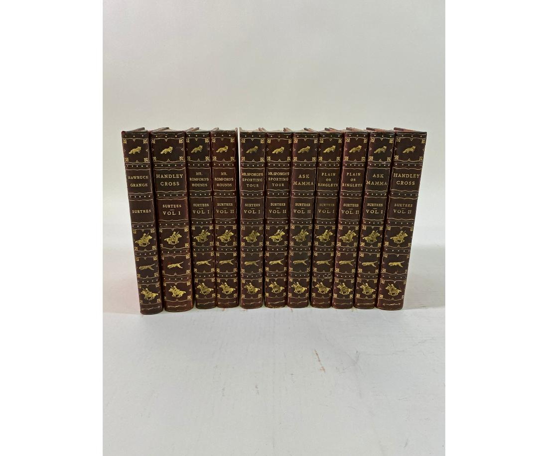 Eleven Limited Edition Surtees Volumes: Eleven Robert Smith Surtees limited edition book volumes with hand-colored engravings to include; Mr. Sponge's Sporting Tour (Vol I & II); Hawbuck Grange; Handley Cross (Vol I & II); Mr. Romford's Hou