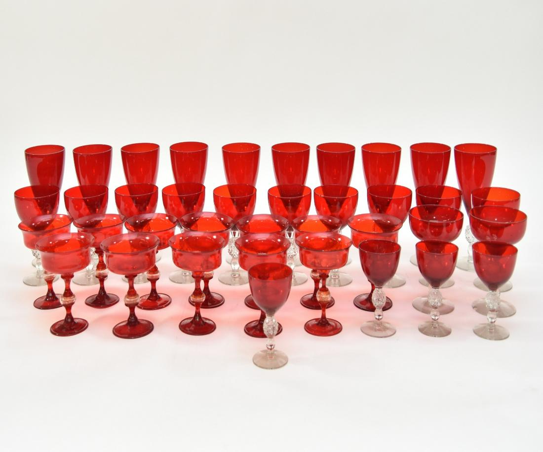 Red Morgantown Glass Goblets: Ten red Morgantown Glass goblets; together with 16 other pieces, and 12 Venetian glass sherbets 4.25"h
