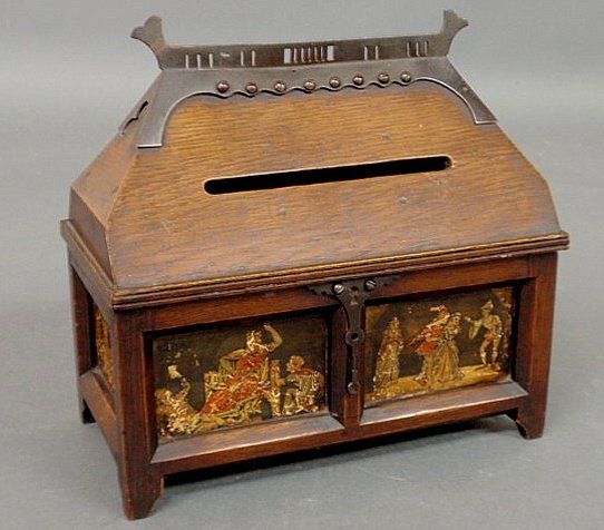 Arts & Crafts oak casket-form ballot box with meta: Arts & Crafts oak casket-form ballot box with metal mounts. 9"h.x9.25"w.x5"d.