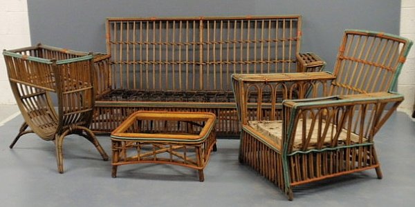Set of vintage American rattan furniture with orig: Set of vintage American rattan furniture with original polychrome accents- settee 31.5"h.x72"w.x26.5"d., chair 31"h.x33"w.x31"d., footstool 10.5"h.x22"x22", plant stand 27.5"h.x29"w.x12"d.