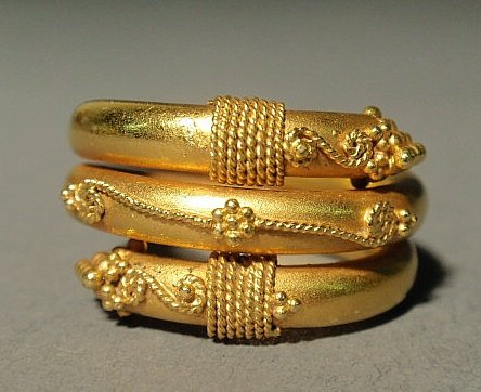 Ladies 22k y.g. ring, wrap Etruscan design. 6.8 dw