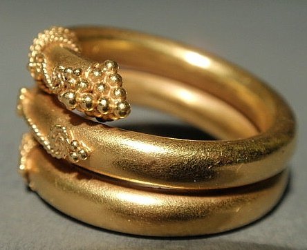 Ladies 22k y.g. ring, wrap Etruscan design. 6.8 dw - 2
