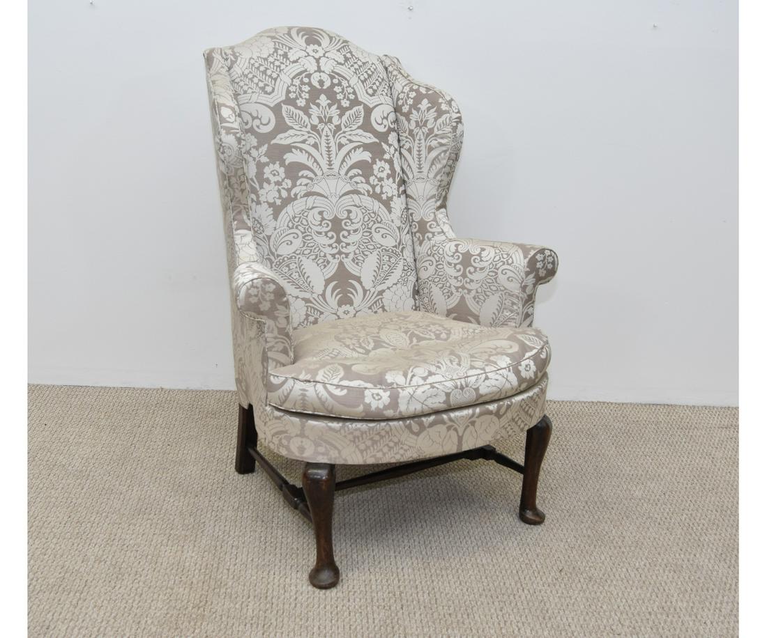 English Queen Anne Wingback: English Queen Anne oak wingback chair, 18th c. 45.5"h x 35"w x 20.5"d