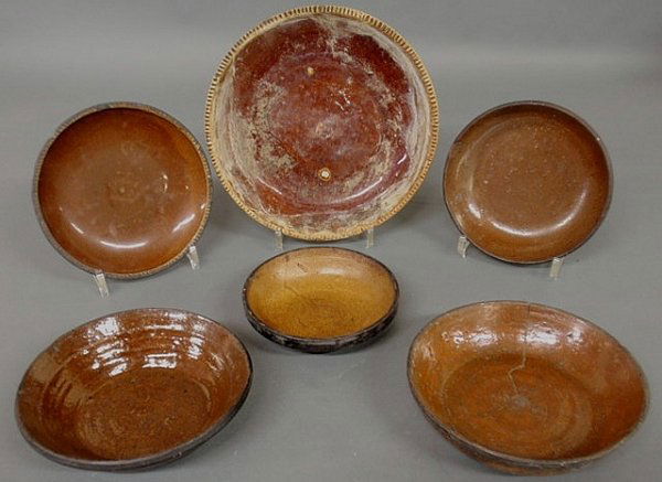 Five Pennsylvania redware pie plates, 19th c., eac: Five Pennsylvania redware pie plates, 19th c., each approx. 10"dia.