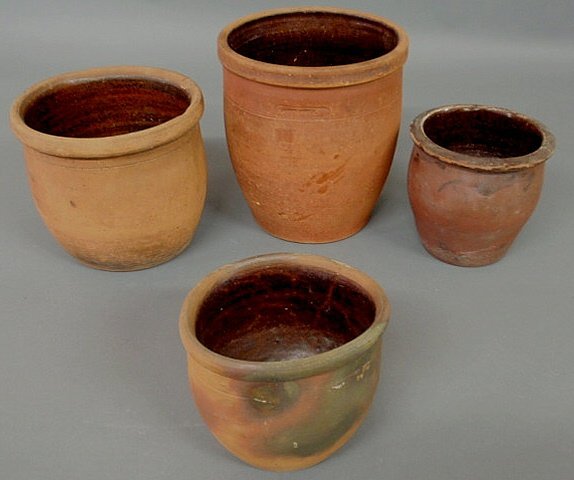 Four 19th c. Pennsylvania redware jars, largest si: Four 19th c. Pennsylvania redware jars, largest signed "John Bell, Waynesboro", 8"h.x7.25"dia.