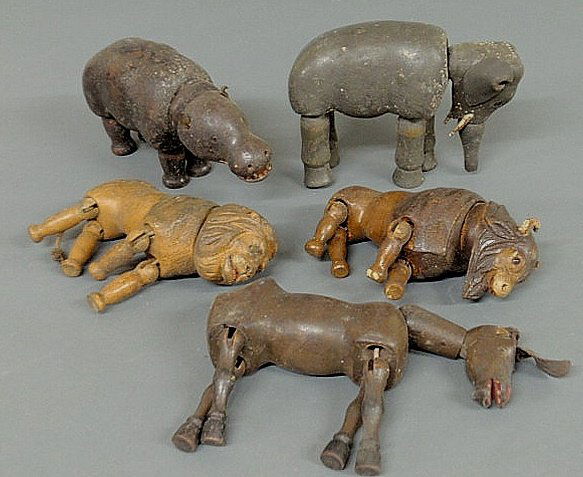 Five Schoenhut carved and jointed animals with ori: Five Schoenhut carved and jointed animals with original paint decoration to include a rare buffalo with glass eyes, largest elephant 6'h.x8"l.