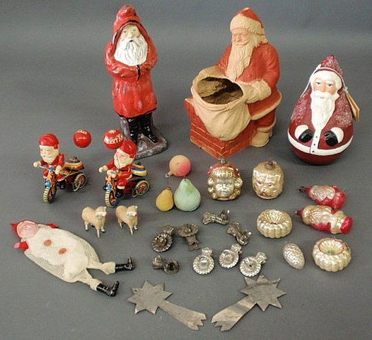 Group of Christmas decorations- 20th c. plaster Be: Group of Christmas decorations- 20th c. plaster Belsnickle, 2 Japanese Suzuki Santas on tricycles 4.25"h., glass ornaments, tin candleholders, etc.