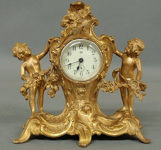Gilt over brass figural mantel clock by Jennings B: Gilt over brass figural mantel clock by Jennings Brothers Mfg. Co., Bridgeport, Conn. 10"h.x9.5"w.