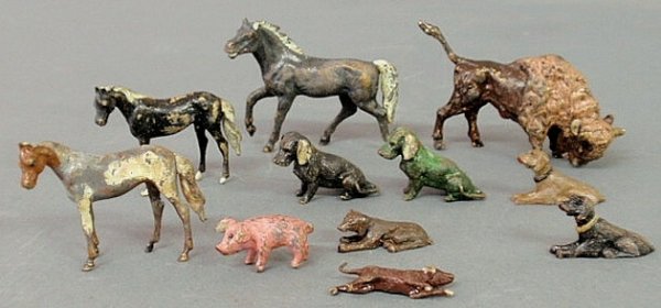Group of eleven paint decorated metal animals, lar: Group of eleven paint decorated metal animals, largest 2"h.