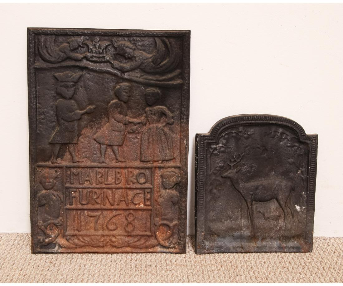 CAST IRON REPRODUCTION FIRE BACK: Cast iron reproduction fire back "Marlbro Furnace 1768"; together with a small stove plate with stag motif. Fireback: 22.5" x 15.5" Stove plate: 14.5" x 12.5"