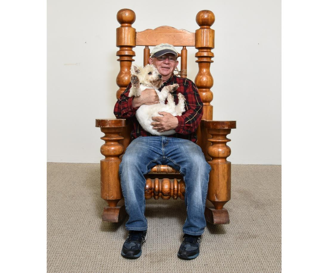 ALPINE ROCKING CHAIR: Alpine style rocking chair with rawhide back and seat. Provenance: Stoudts Black Angus Restaurant. 56"h x 34"w x 22"d / 40" rockers