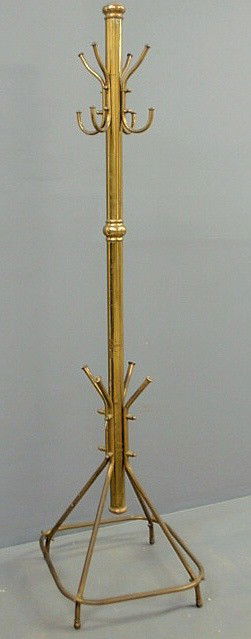 Brass coat rack, early 20th c., from the New Centu: Brass coat rack, early 20th c., from the New Century Trust Building, Philadelphia, PA. 73"h.