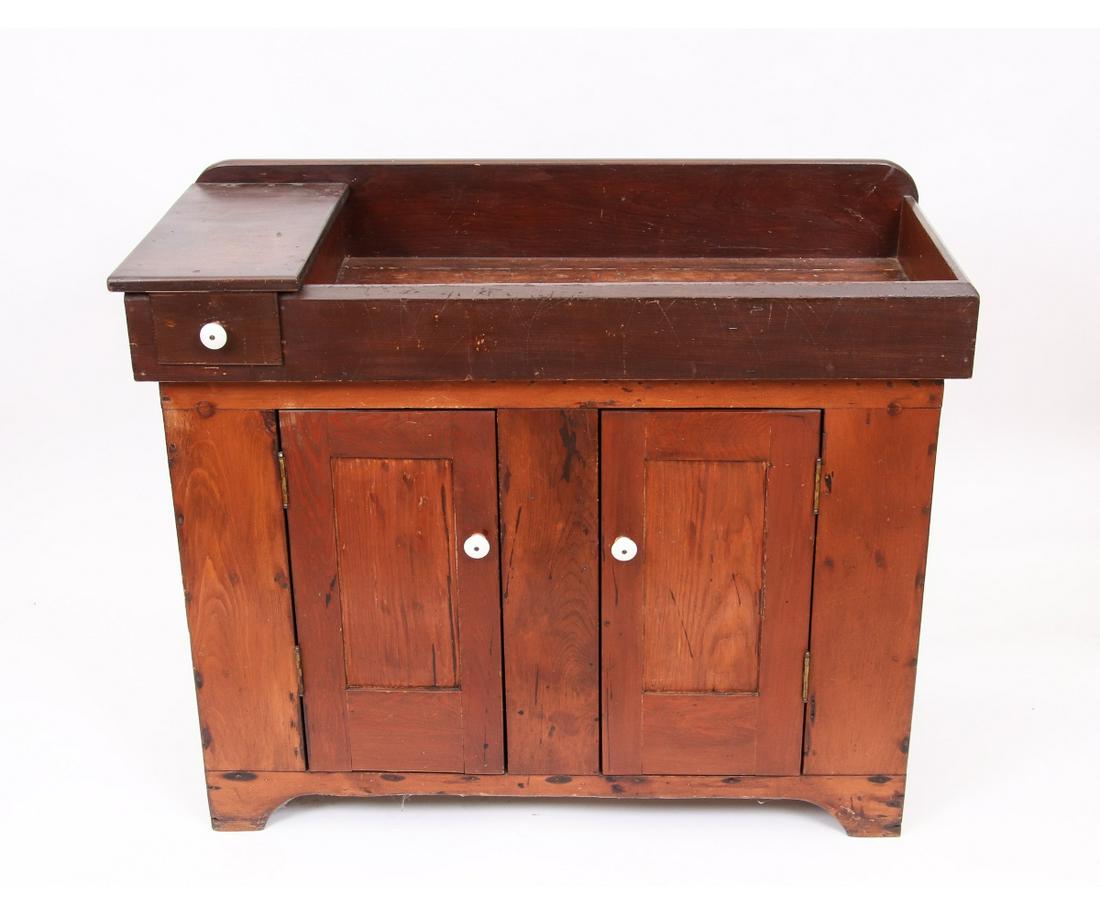 PINE DRY SINK: Pine dry sink, circa 1860, with single drawer above two doors. 35.25"h x 42.5"w x 18.5"d