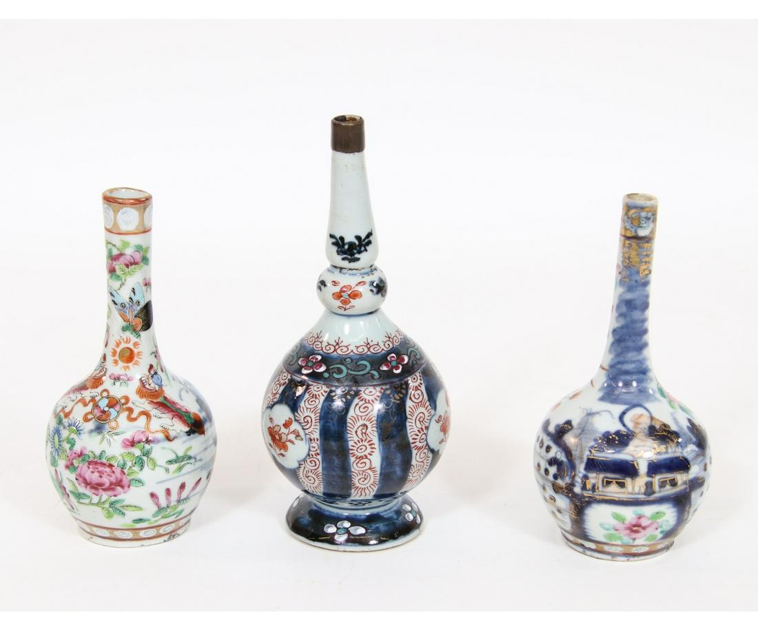 THREE EARLY CHINESE PORCELAIN BUD VASES (1 of 4)