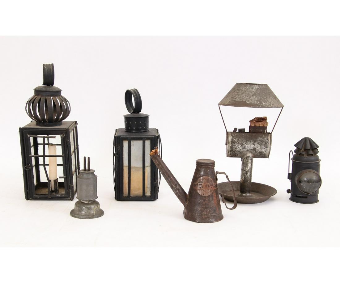 EARLY TIN LANTERNS: Two early tin lanterns, tallest 15"h; together with a 'dark' lantern used by police and military watchman; railroad lighter by Eagle; a tole lamp etc.