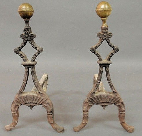 Pair of cast iron and brass ball-top andirons, ear: Pair of cast iron and brass ball-top andirons, early 19th c. 17"h.x8"w.x12"d.