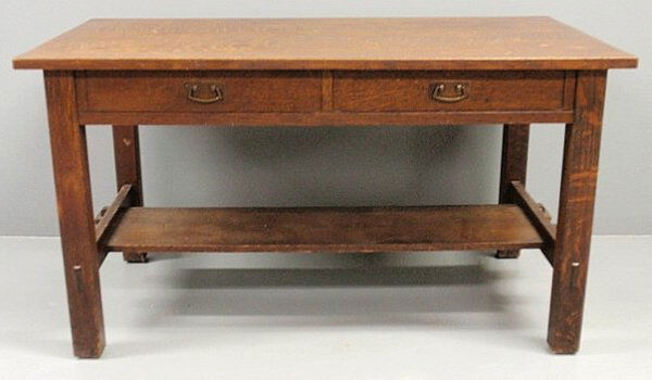 Large L. & J.G. Stickley oak desk with mortise and: Large L. & J.G. Stickley oak desk with mortise and tenon construction and original pulls and label. 29.5"h.x54"w.x32"d.