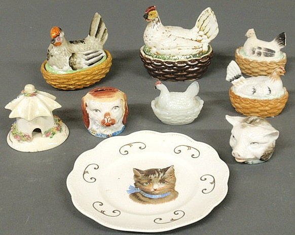 Four small 19th c. Staffordshire hens-on-nests, la: Four small 19th c. Staffordshire hens-on-nests, largest 4"x4", a milk glass example, two animal head banks, etc., nine pieces.