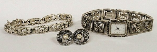 Sterling silver and marcasite ladies wristwatch an: Sterling silver and marcasite ladies wristwatch and bracelet together with a pair of similar costume earrings.