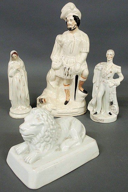 Grouping to include three 19th c. Staffordshire fi: Grouping to include three 19th c. Staffordshire figures- Highlander hunter 17"h., Wellington 11"h., woman figure and an unmarked ironstone recumbent lion 9"l.