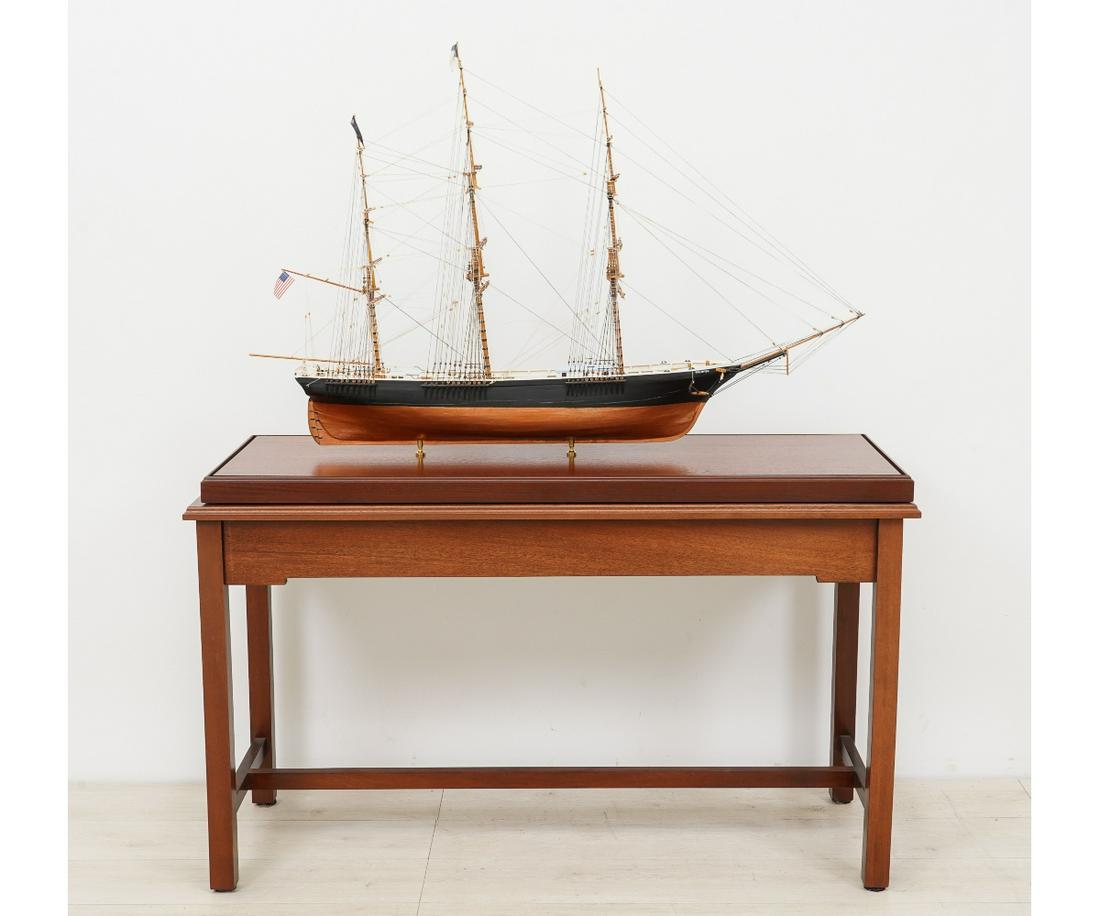 LARGE WOOD CLIPPER SHIP MODEL: Large wood model of clipper ship "The Sea Witch" built from scratch using the plank on bulkhead method, mounted in a mahogany/glass custom case and stand. Provenance: Columbia Trading Co., Hyannis, MA